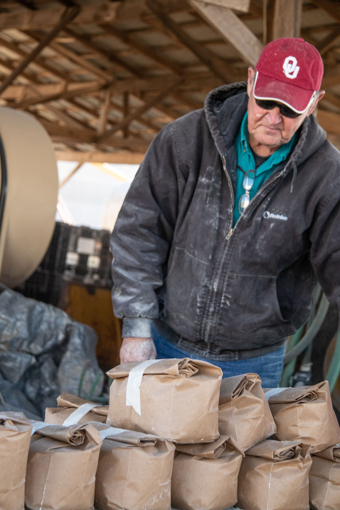 Charles Pearson bagging cornmeal